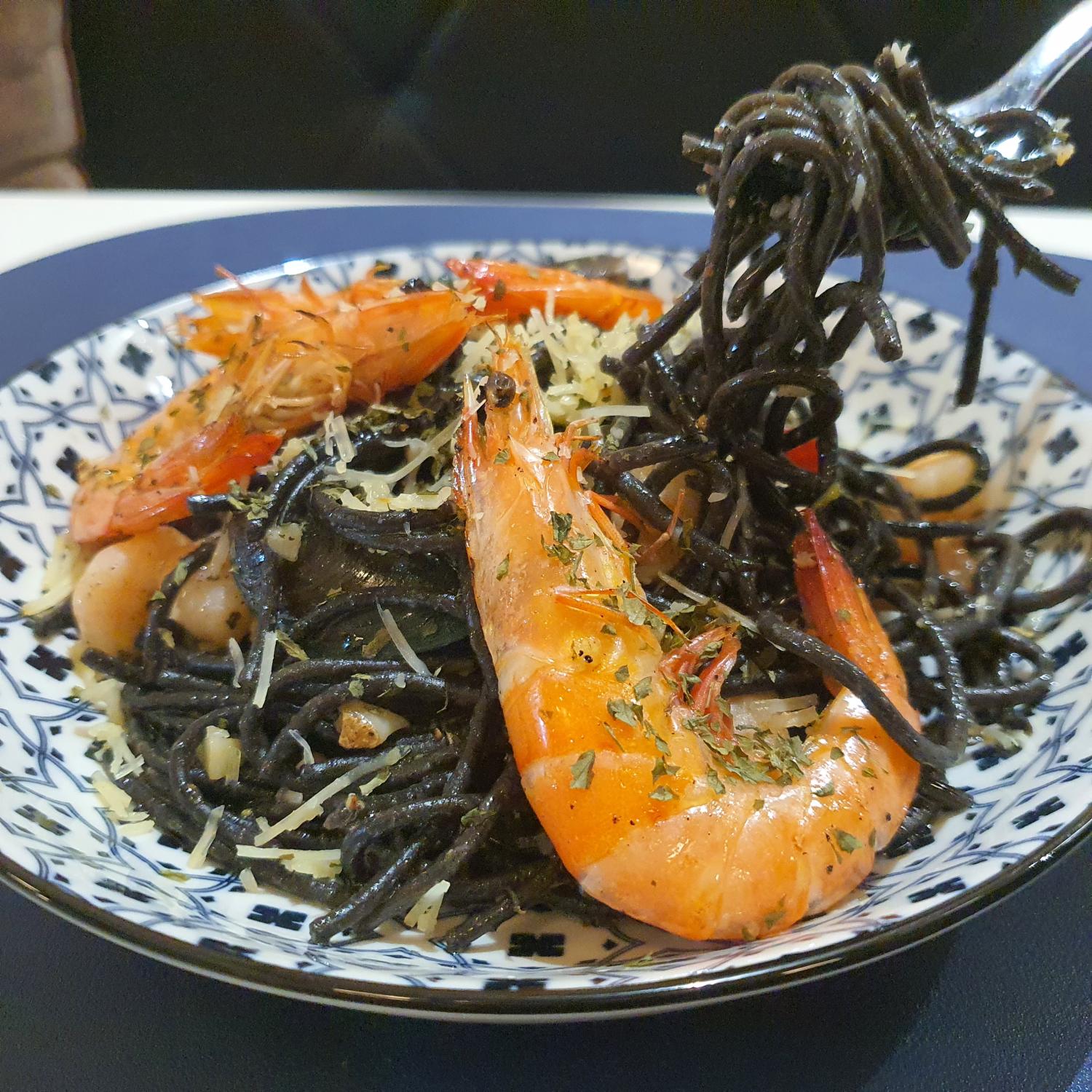 Squid Ink Aglio Olio with Grilled Prawns and Seafood Medley